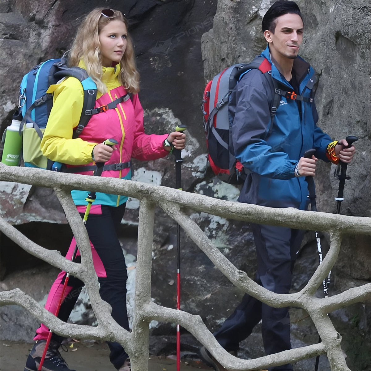 Carbon Folding Walking Stick carried on a hike - Fluorescent Red and Green - Black