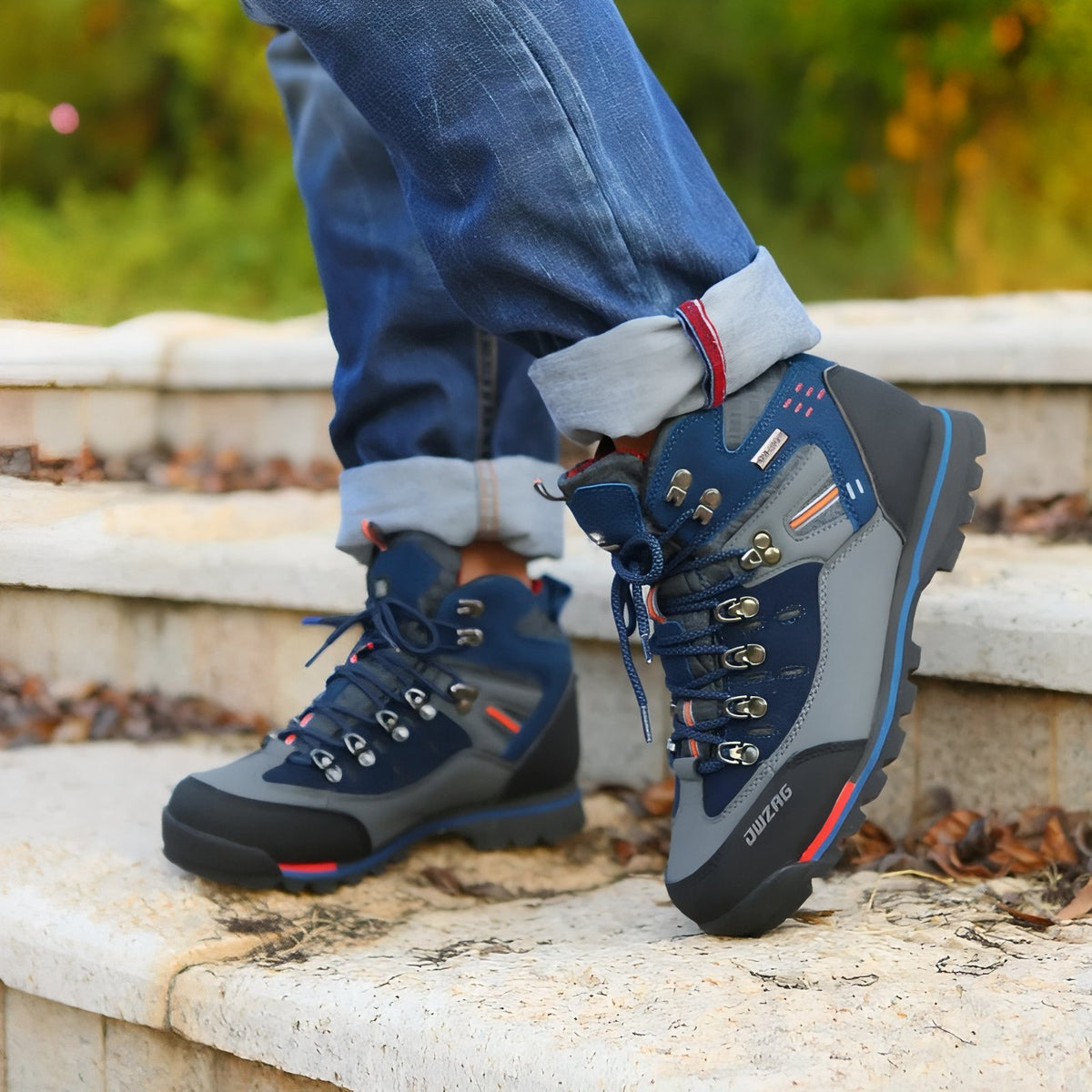 Men's Mountain Hiking Shoe worn on stairs - Black and Orange - Navy Blue and Gray - Gray and Red