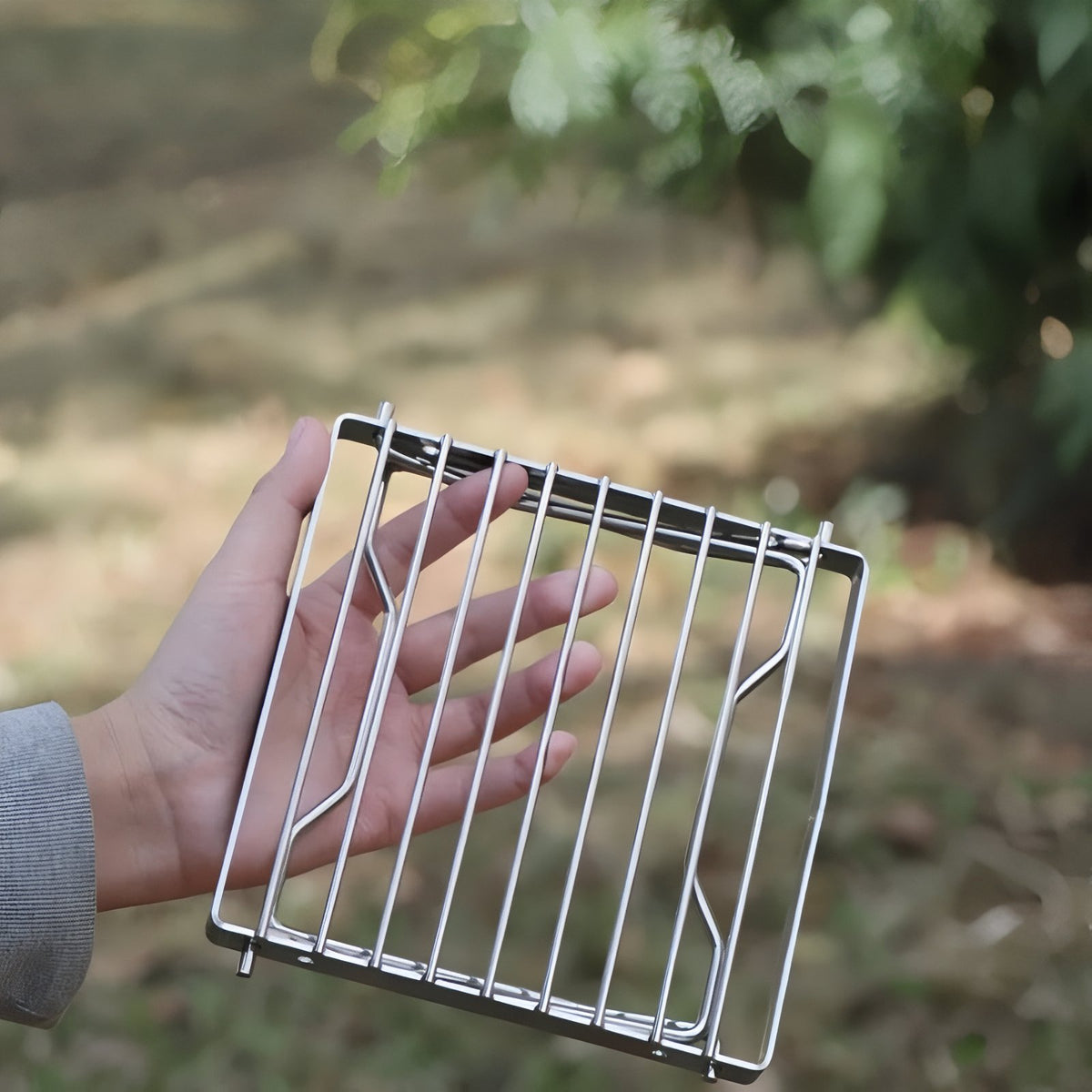Grill Grid For Gas Stove carried by hand