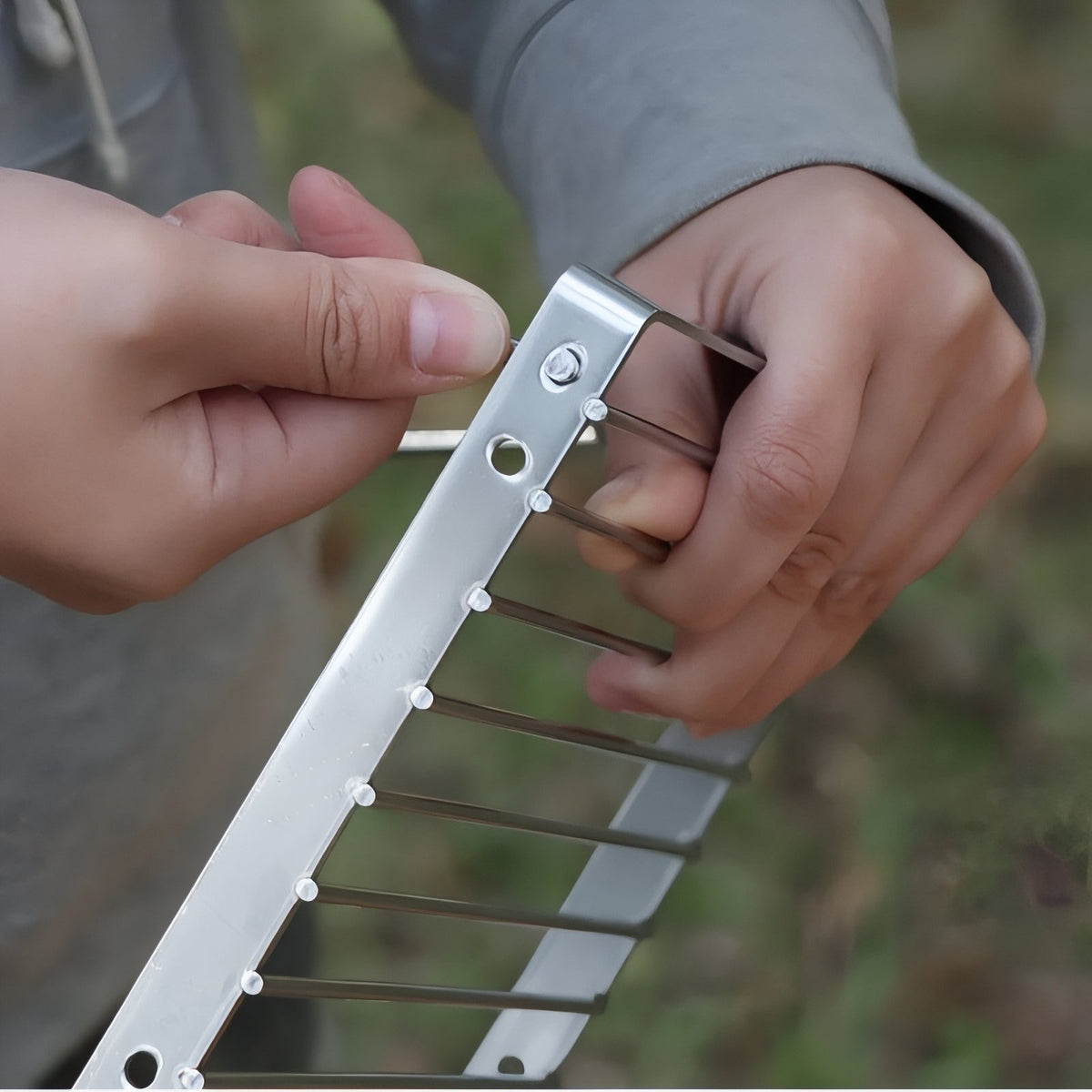 Close-up of Gas Stove Grill handling