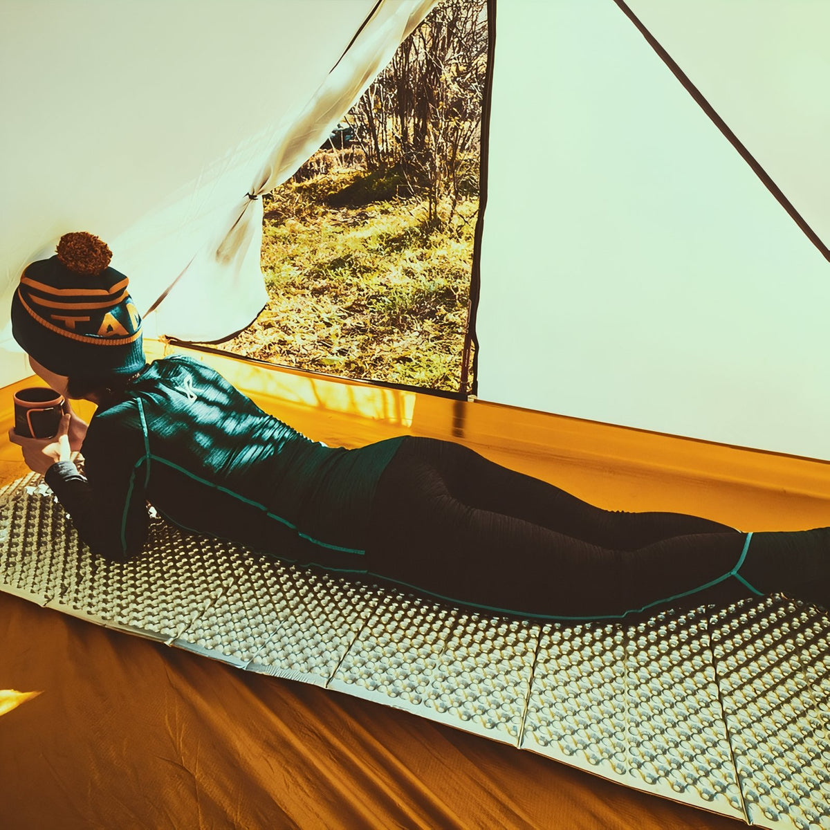 Foldable Hiking Mattress in tent setting - Yellow - Dark Brown