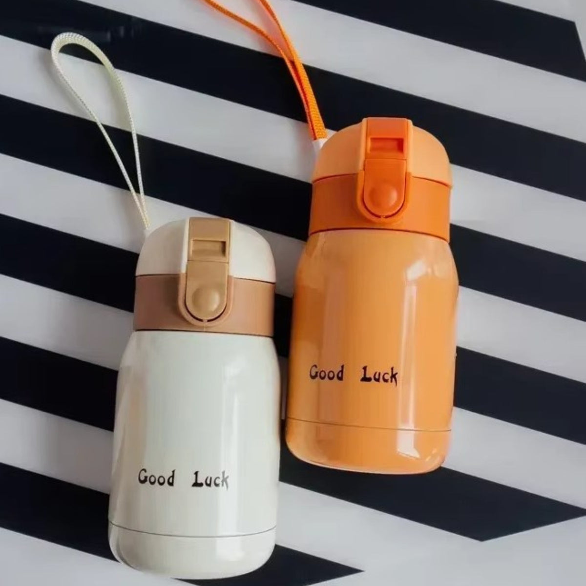 Mini Insulated Bottle 200ml two bottles aligned - Pink - White - Raspberry - Turquoise - Orange