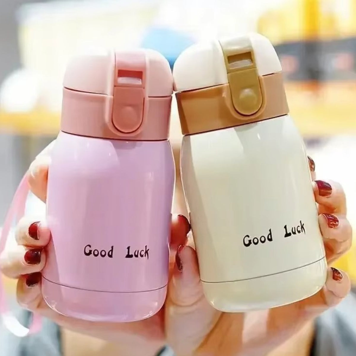 Mini Insulated Bottle 200ml two bottles in hand - Pink - White - Raspberry - Turquoise - Orange