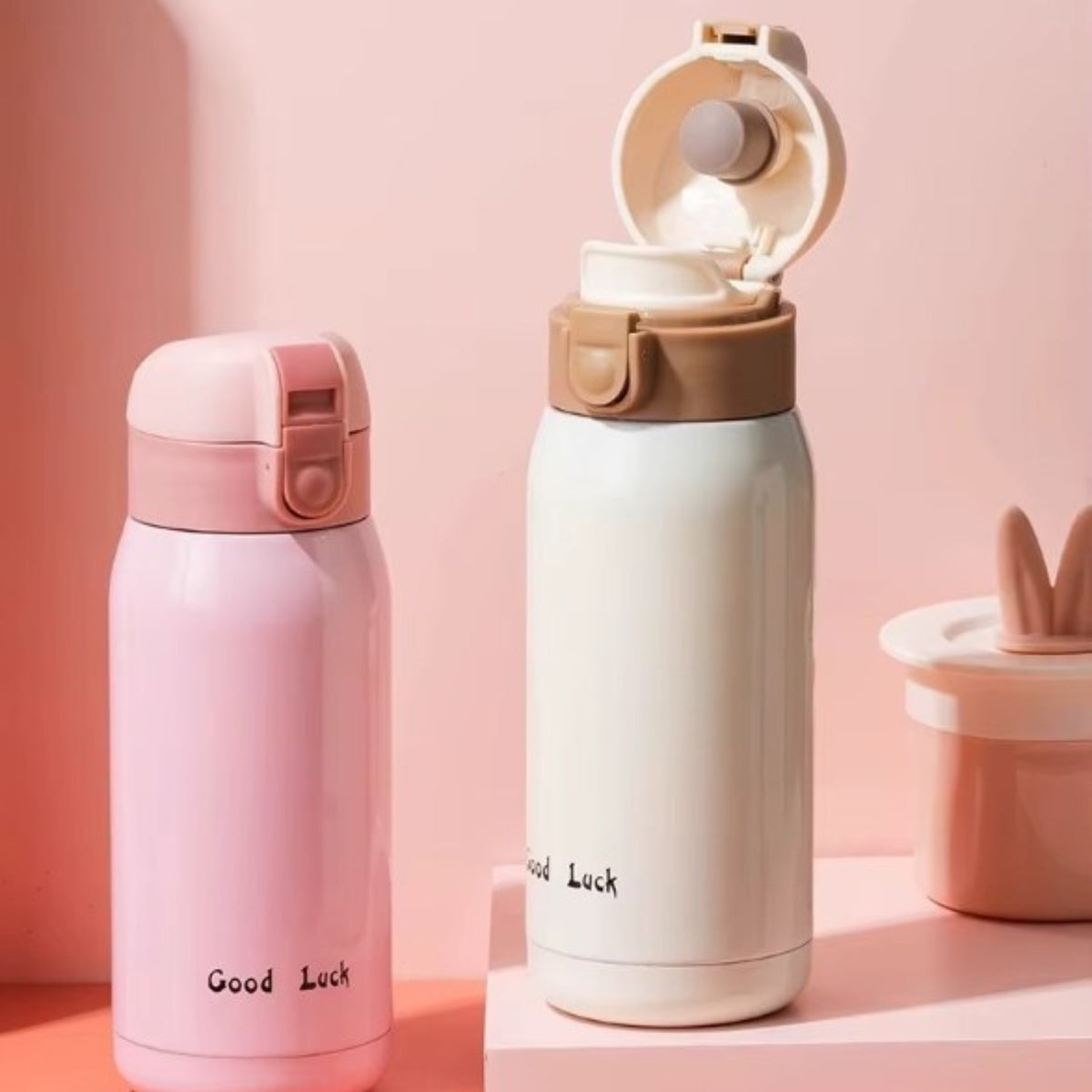 Mini Insulated Bottle 200ml two bottles aligned - Pink - White - Raspberry - Turquoise - Orange