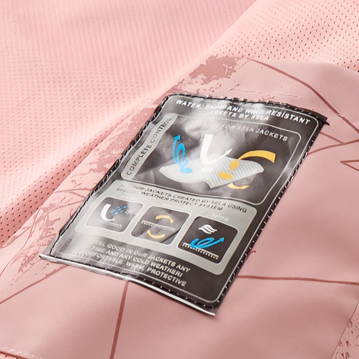 Women's Waterproof Hiking Jacket close-up product label - Pink 1 - Purple 1 - Green Women - Purple 2 - Pink 2 - Black - White