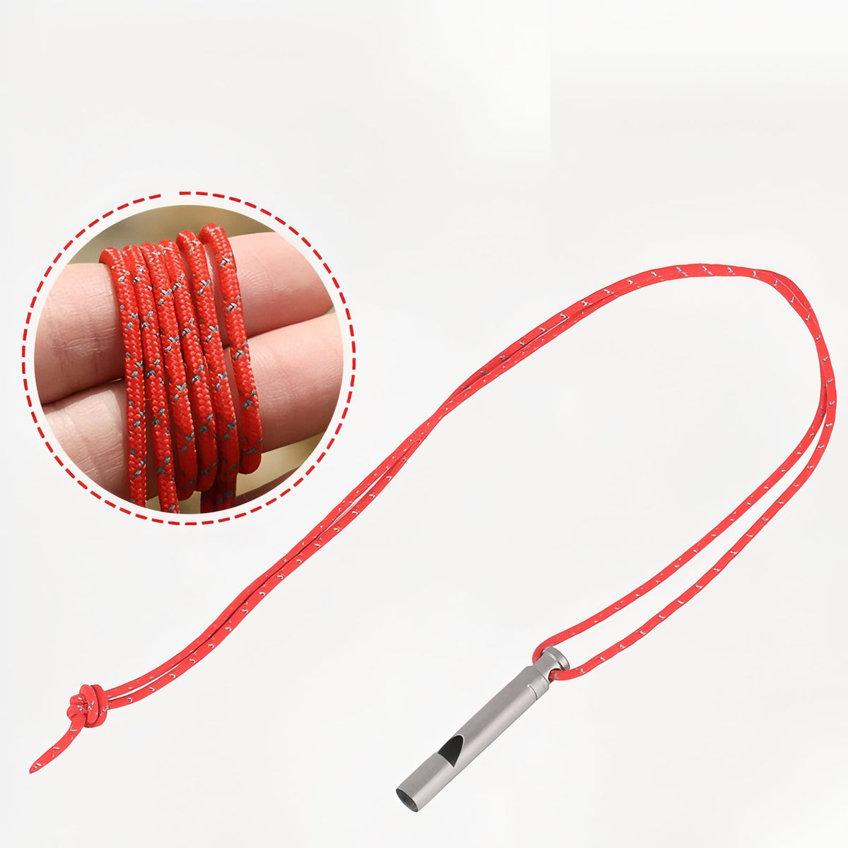 Close-up of Titanium Hiking Whistle with red cord - Grey