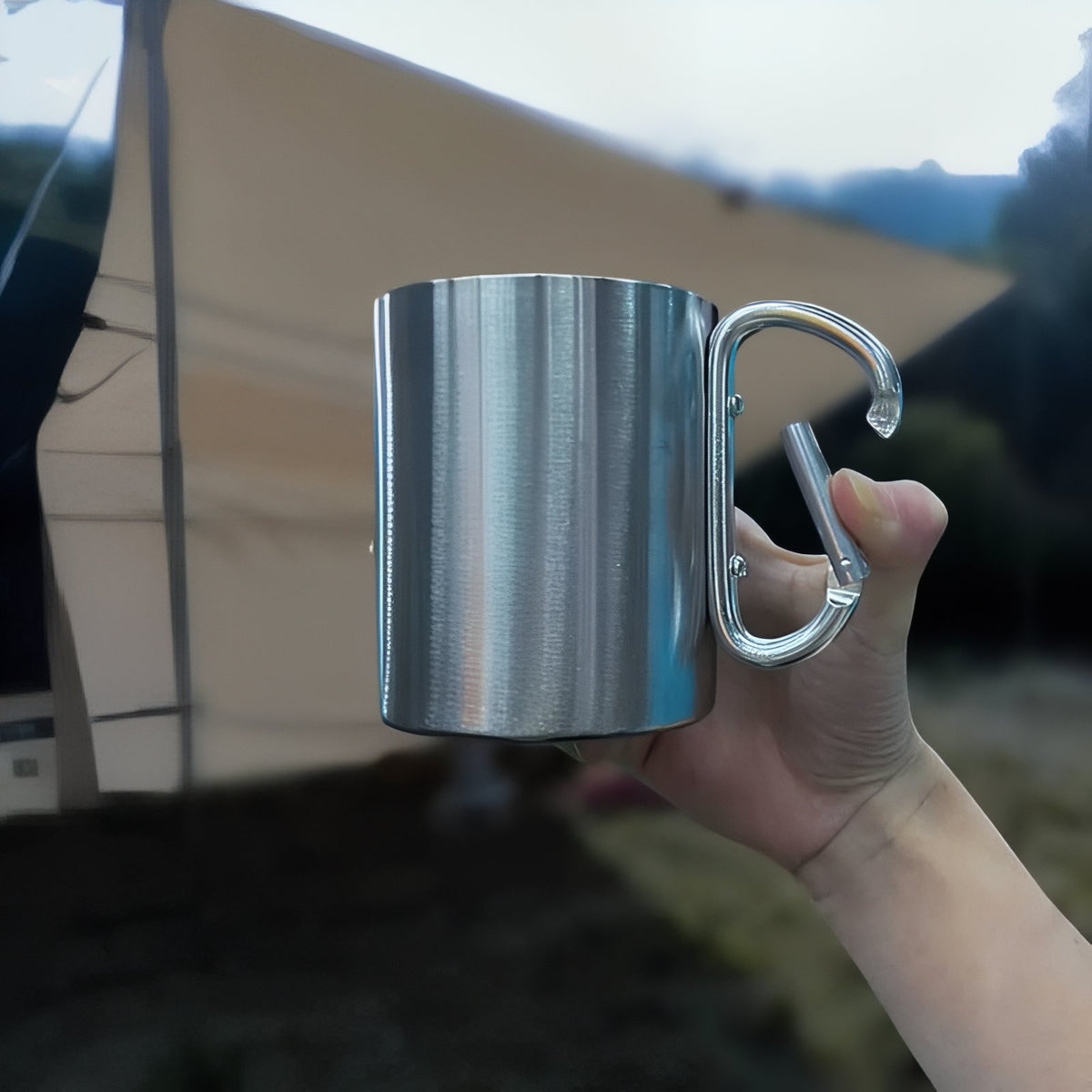 Stainless Steel Carabiner Mug carried by hand - Grey